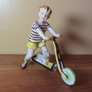little boy & his dog on a scooter ceramic vintage Japan (W6035)